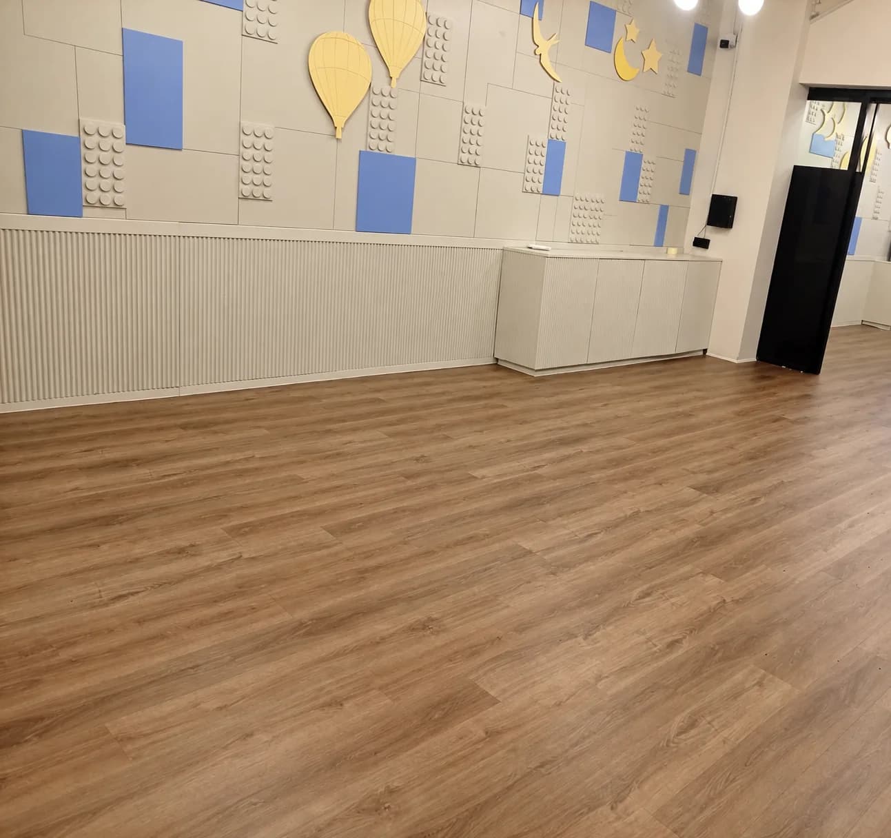 Wood-look flooring in a children's play space